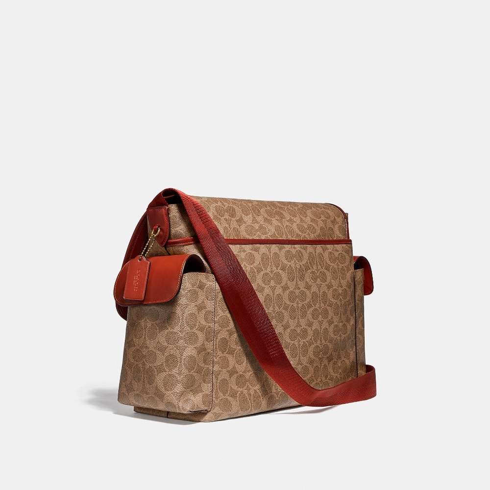 Baby Messenger Bag In Signature Canvas
